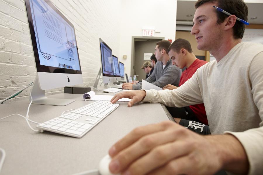 Student on computer in math class